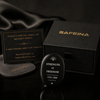 Black obsidian crystal keepsake with laser engraved Strength of Freedom 1776–2026 design – front view, SAFEINA
