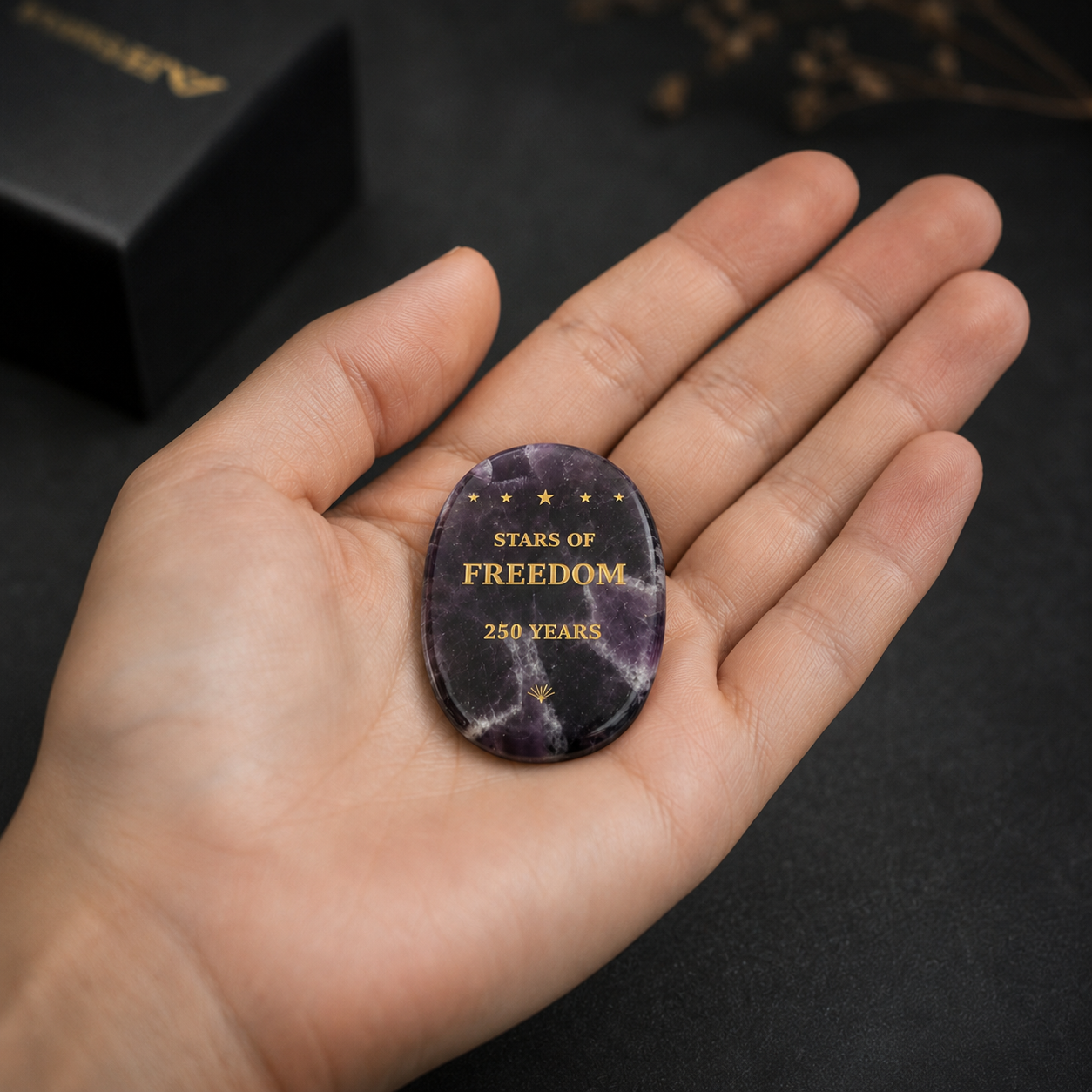 Close-up of laser engraved Stars of Freedom design on natural amethyst crystal keepsake – SAFEINA