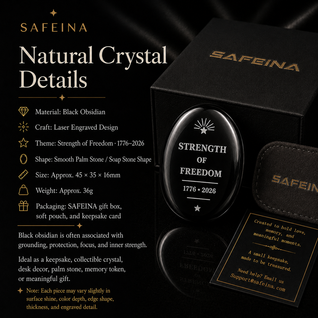 Black obsidian Strength of Freedom palm stone held in hand showing smooth soap stone shape and size